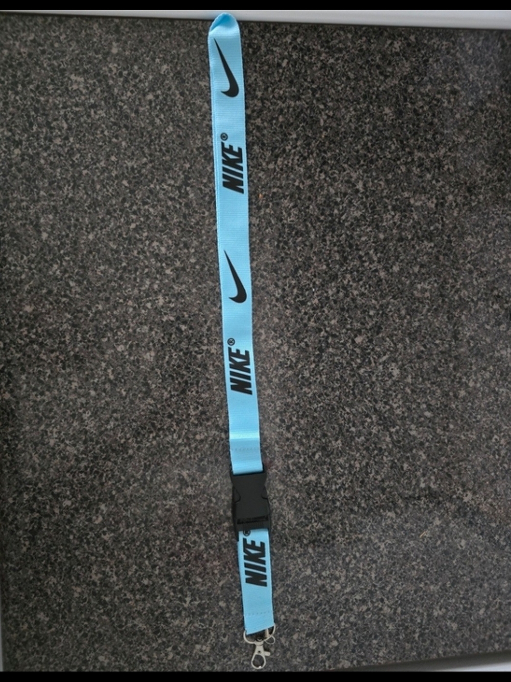 Nike Light Blue Lanyard with Black Swoosh